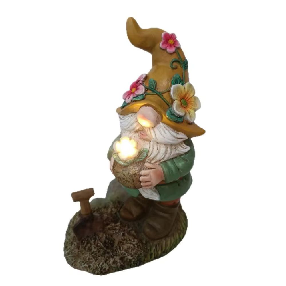 Nain de jardin à fleur lumineuse sur fond blanc