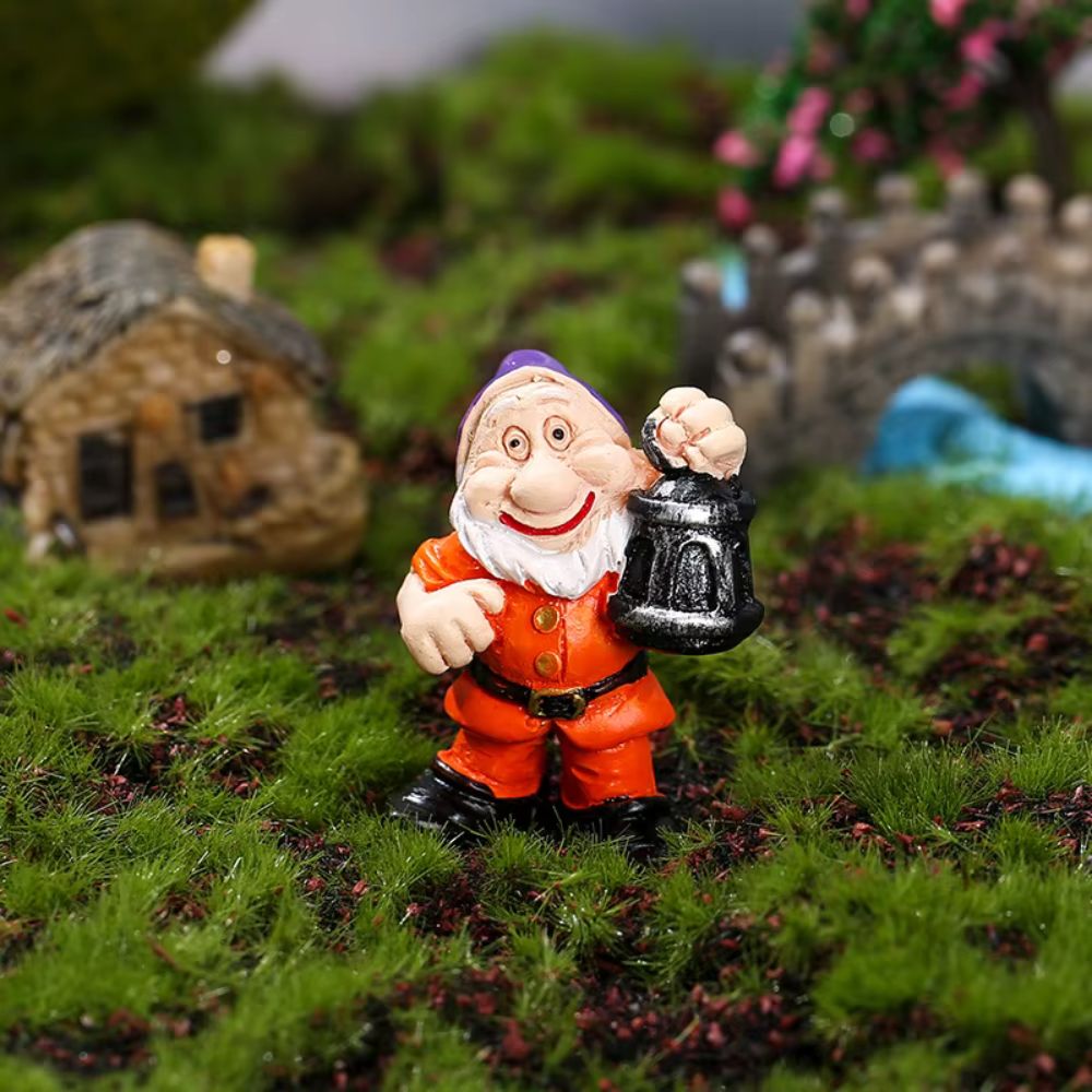 nain de jardin blanche neige avec lanterne