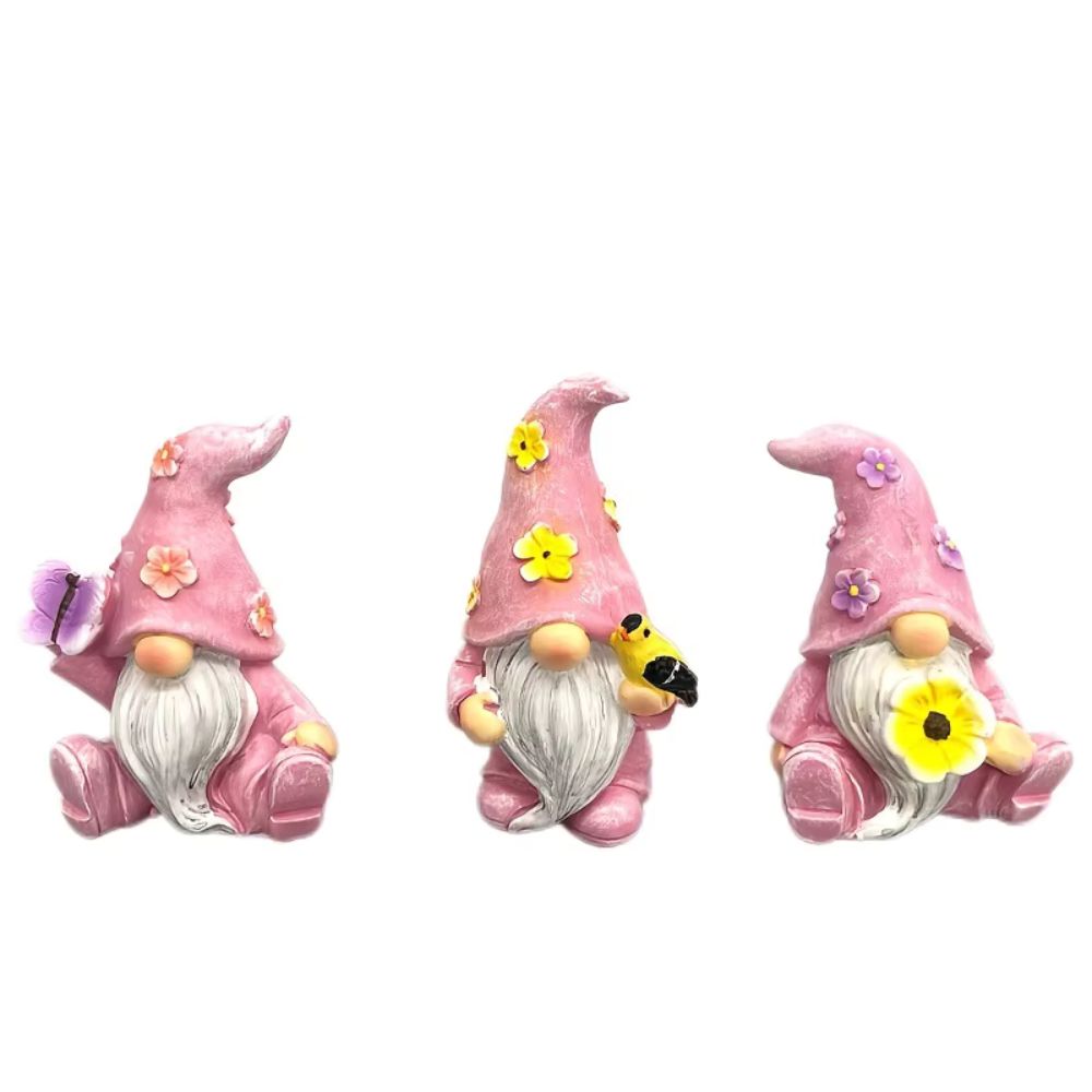 Lot de 3 nains de jardin de couleur rose sur fond blanc