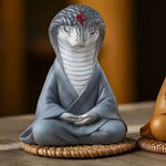 nain de jardin serpent gris