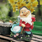 nain de jardin avec projecteur