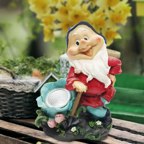 nain de jardin avec projecteur