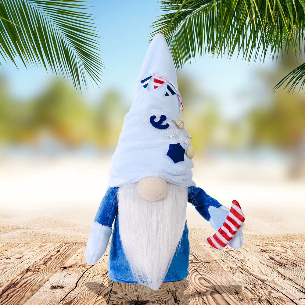nain de jardin breton avec chapeau blanc